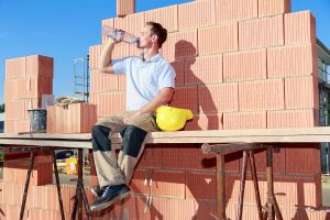 Construction Worker dealing with Summer Heat. 